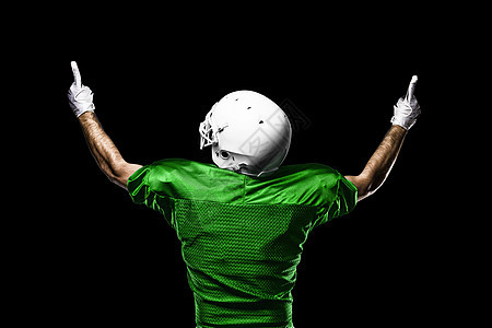 足球运动员黑色体育职业垫肩运动影棚竞技体育场运动服绿色图片