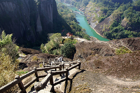 中国福建省武伊山峡谷 中国岩石太阳风景晴天场景林地流动溪流季节石头图片