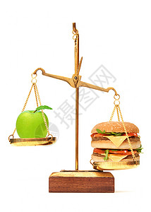 苹果和汉堡之间的饮食选择背景图片
