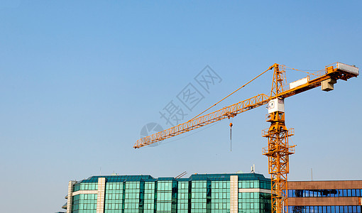 进行中的工作机器工程阳光项目日落摩天大楼城市晴天建筑财产图片