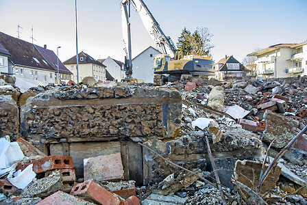 拆除区裂缝损害建造碎片社论瓦砾机械机器破坏建筑图片