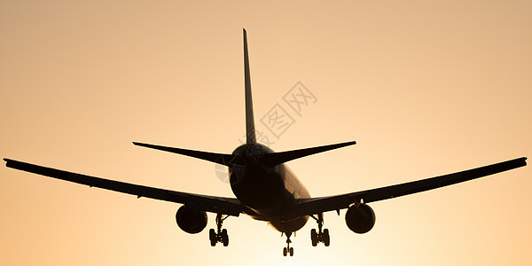洛杉矶机场旅游运输天空飞机场交通阳光橙子飞机低角度飞行图片
