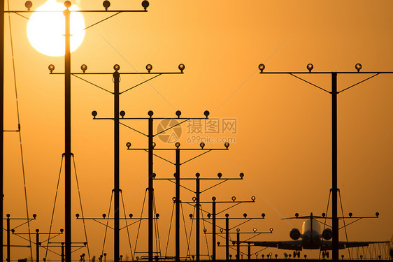 洛杉矶机场飞机跑道方式运输日落目的地旅游太阳飞行橙子图片