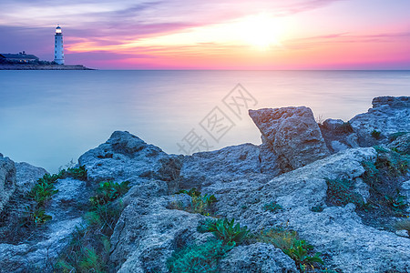 灯塔海滩戏剧性地平线海洋探照灯蓝色建筑天气海岸线悬崖图片