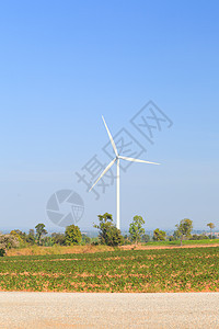 风力涡轮发电机旋转风车农场场地绿色白色生态工业翅膀技术图片