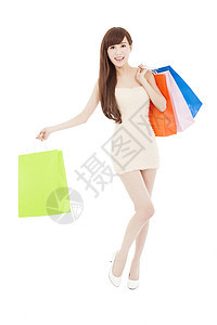 满身笑容的亚洲女人拿着购物袋购物者幸福美丽卡片销售快乐储蓄顾客乐趣成人图片
