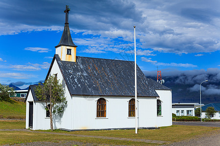 典型的农村冰地教堂海洋旅行场地建筑历史场景尖顶石头地平线阳光图片
