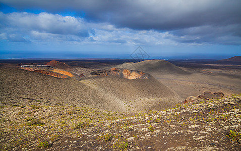 Timanfaya山脉火灾骆驼干旱太阳洞穴海岸棕榈公园场地旅行石头图片