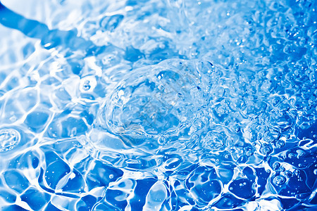 蓝水飞溅蓝色海浪运动气泡宏观波纹流动液体图片