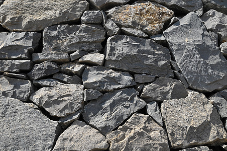 灰岩古城墙鹅卵石石墙矿物大理石建筑学黑色灰色材料水泥宏观图片