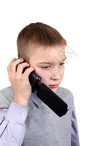 男孩在手机上说话男性动荡呼唤讲话青少年衬衫电话男生刺激悲伤图片
