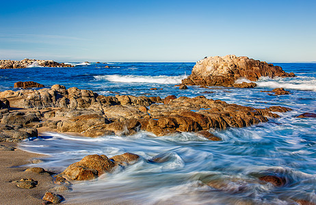 即将上岸的梦幻海浪风景海滩海洋公园支撑蓝色全景波浪花园岩石图片