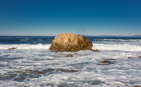 即将上岸的梦幻海浪天空海滩海洋岩石树林风景丛林蓝色公园海岸图片