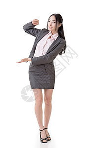 女商务人士持有一些东西姿势魅力推介会说明手势职业操作人士商业展示图片