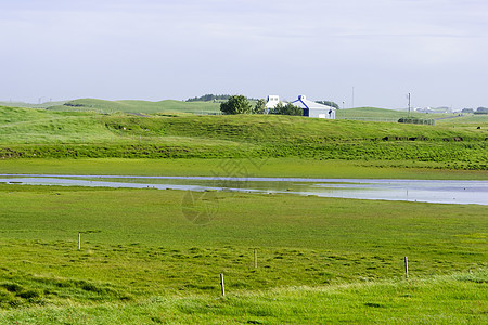 美丽的冰岛 美好的夏季天气场地农村池塘场景太阳村庄草原天空草地旅游图片