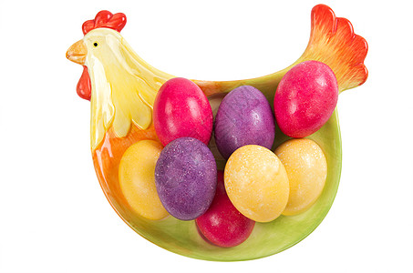 复活节宗教母鸡持有者紫丁香黄色白色盘子紫色粉色背景图片