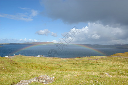 天空彩虹旅行海洋岩石风景海岸图片