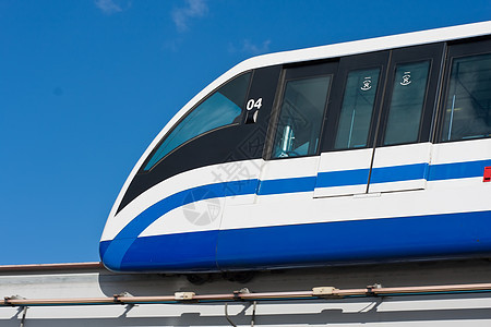 单轨列车城市旅行交通建筑学蓝色乘客铁路天空运输车辆图片