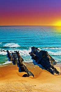 海洋海景支撑脚印海滩天空脚步蓝色岩石泡沫日落图片