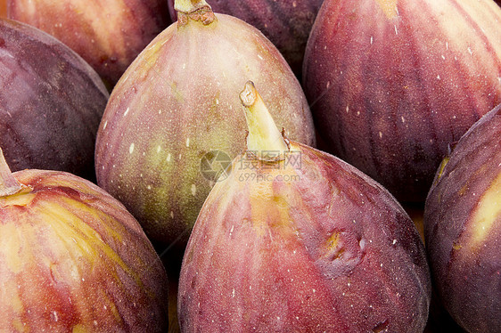 图果水果红色热带绿色棕色紫色市场宏观木头种子图片