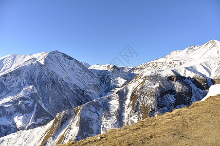 格鲁吉亚高加索山 高加索山顶峰古道岩石天空阳光蓝色太阳旅行图片