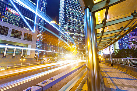 夜间在香港的交通建筑学人行道天桥旅行城市蓝色地标立交桥照明路面图片