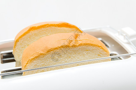面包和托阿斯特小吃技术燃烧烹饪工作室流行音乐机器厨具早餐金属背景图片