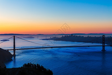 金门金门大桥 旧金山日出加利福尼亚天际吸引力市中心旅行运输工程建筑学橙子蓝色海洋图片