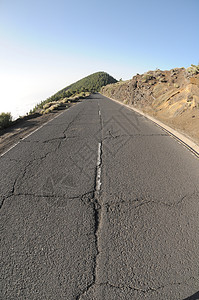 孤独路驾驶沥青皂角公园红色天空蓝色运输风景岩石图片