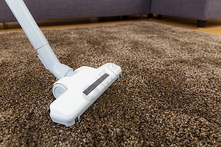 客厅内带吸尘器的棕色地毯整洁织物塑料小地毯管道真空羊毛金属插图清洁工图片