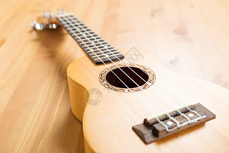 乌库莱莱语Name棕色娱乐国家木头地面乐器吉他乐队细绳音乐图片