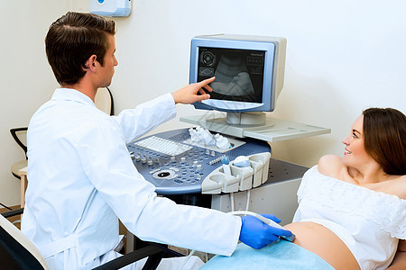 接受医生诊治的怀孕妇女卫生保健生育力医院成人检查女士婴儿诊所测量图片
