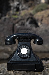贵重电话玩具黑色古董怀旧背景图片