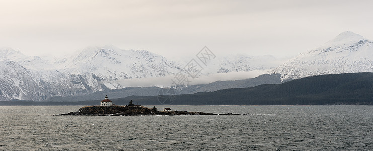 阿拉斯加的雪覆盖山旅行树木地球日落公园冻结岩石仙境天线天空图片