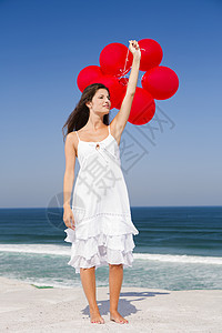 带着红色芭蕾舞的漂亮女孩青年蓝色微笑幸福乐趣气球自由享受女性假期图片