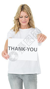手持感谢纸的微笑的女性志愿者图片