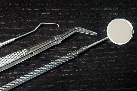 牙科工具外科衰变洞穴镜子棉布刮匙持有者卫生唾液钳子图片