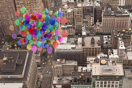城市上方许多彩色气球计算机景观乐趣建筑摩天大楼绘图派对图片