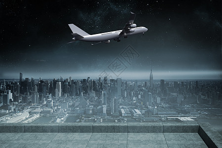 阳台俯视城市的复合图像景观航空多云飞行灰色飞机旅行计算机航班旅游图片