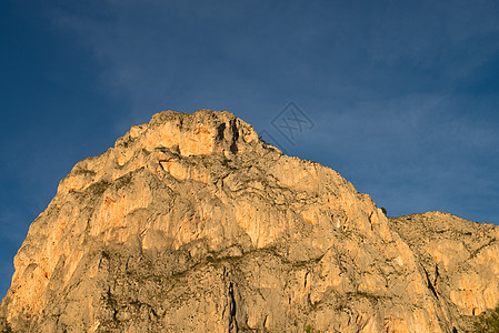 山区山峰高峰水平侵蚀悬崖砂岩岩石石灰石风化赭石顶峰图片
