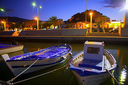 日落之夜 戴尼亚港码头船坞和传统游艇图片