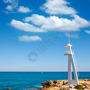 地中海阿利坎特海的德尼亚Denia海浪石头岗楼晴天海岸蓝色支撑旅行环境假期图片