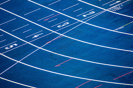 运行轨道体育场蓝色运动起跑线竞赛车道背景图片