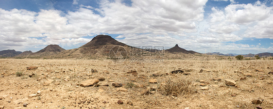纳米比亚Kaokoland游戏保护区的超真实全景天空河床晴天岩石纳米布荒野旅游土地地平线干旱图片