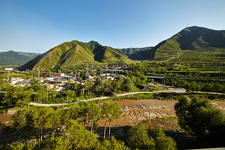 中国外衣风景晴天运动河岸农村天空爬坡绿色蓝色乡村房子图片