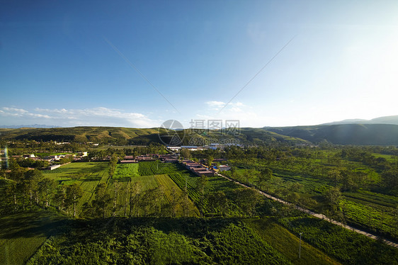 中国外衣风景种植园晴天农村旅游蓝色植物房子运动绿色爬坡图片