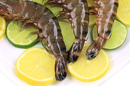 盘子里有生虎虾老虎美食饮食水产绿色柠檬动物养殖贝类海鲜图片