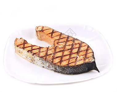 烤熟的鲑鱼牛排油炸正方形蔬菜条纹白色鱼片餐厅橙子食谱粉色图片