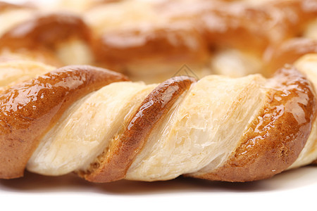 白色背景上的 Knot 形状饼干食品脆皮食物小麦面包美食小吃结状营养包子图片