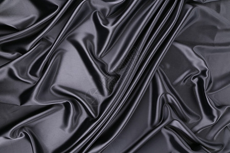 黑色丝绸衣服床单编织材料织物窗帘背景图片